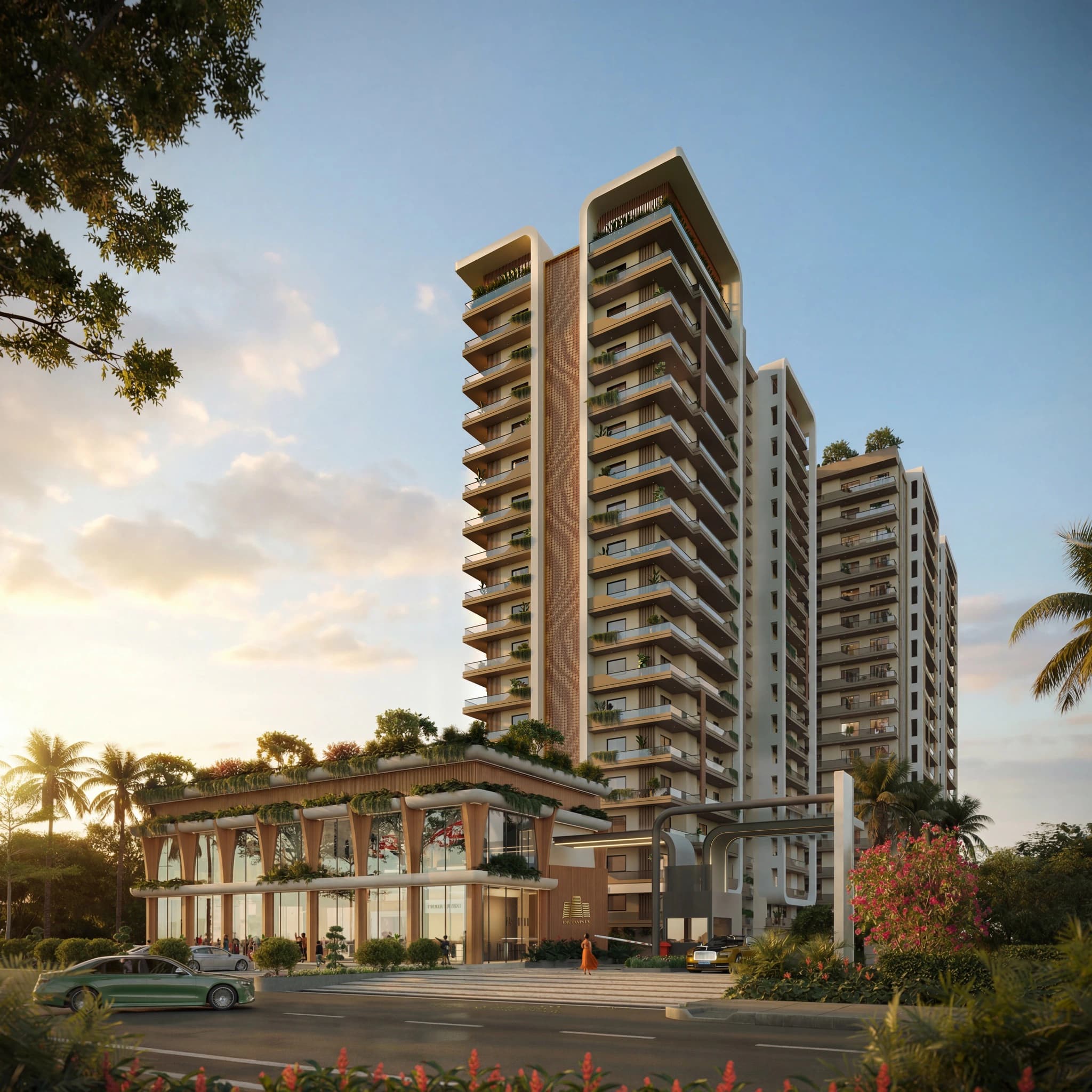 Divya Vista high-rise residential towers rising above a low-rise podium at golden hour